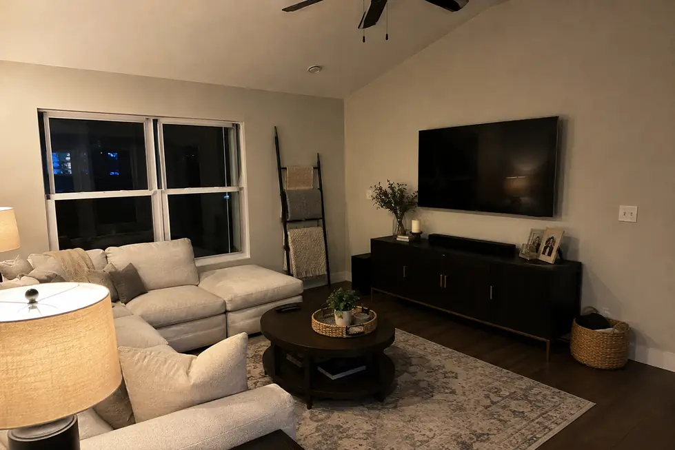 Living room with a repainted TV wall, seen in the evening
